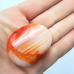 carnelian palm stone, orange with white shade, gemstone, crystals, fire element