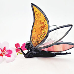 Orange & Pink Stained Glass Laying Fairy, sit on the window sill, sun shines through her wings, lights up the room, sits on the shelf