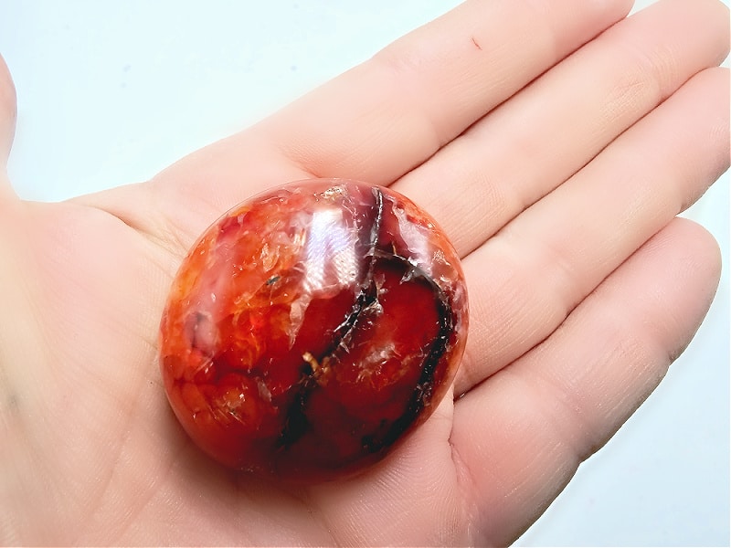 carnelian palm stone, orange gem stone, crystal, polished