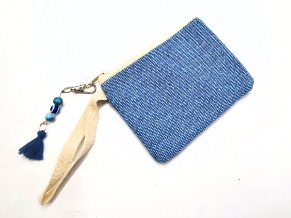 plain blue zip purse with evil eye charm