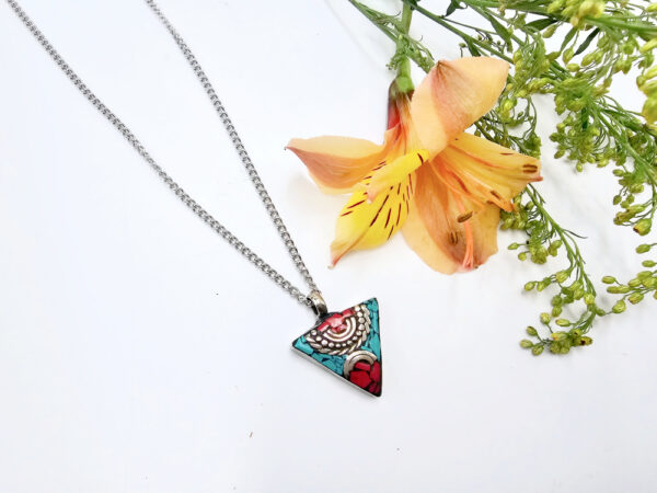 Tibetan triangle necklace on a stainless steel necklace