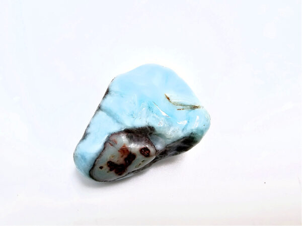 Larimar polished stone with black markings