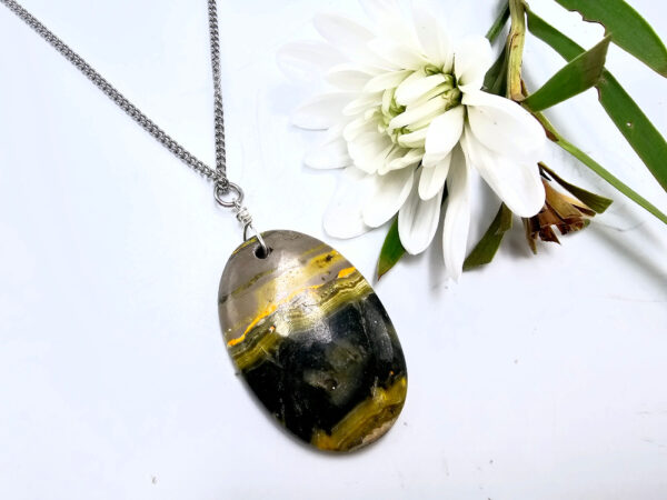 Bumble Bee Jasper oval pendant on a stainless steel necklace