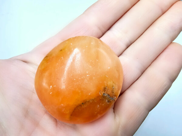 Orange Twist Calcite Palm Stone C (56g)