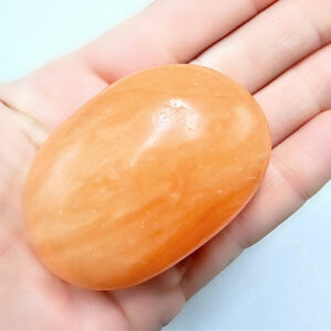 Orange Twist Calcite Palm Stone D (92g)