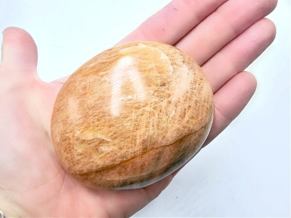 Peach moonstone palm stone