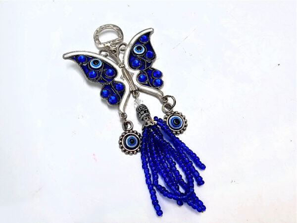 Evil eye butterfly talisman with tassel