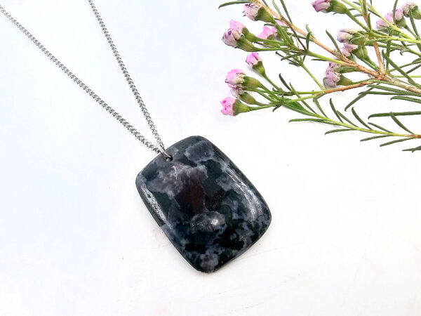 Merlinite square stone on a stainless steel necklace