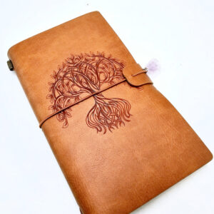 Tan colour journal with a tree of life cover