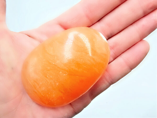 Orange Twist Calcite Palm Stone