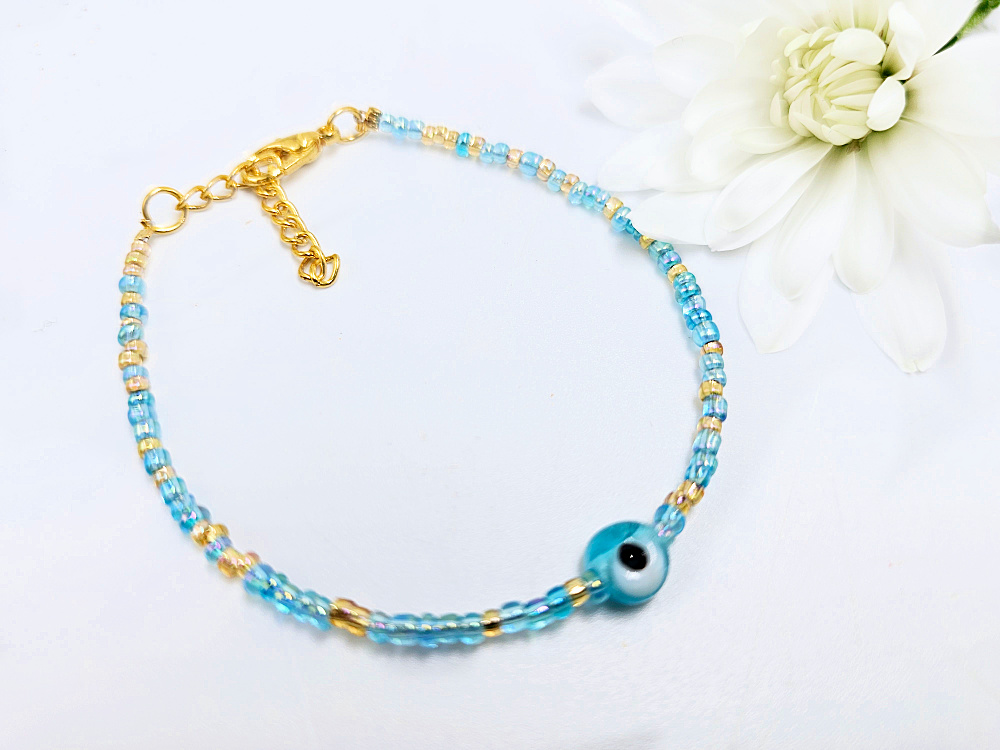Evil Eye Seed Bead Bangle (Blue) Evil Eye Seed Bead Bangle (Blue)