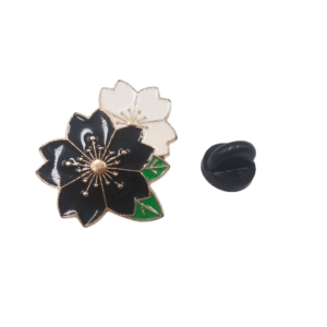black and white pin badge