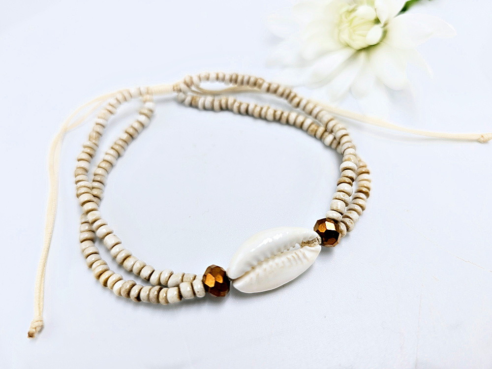 Cowrie Bangle with Beige Beads Cowrie Bangle with Beige Beads